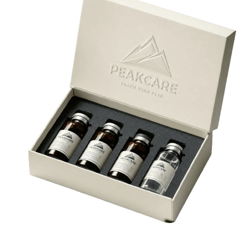 Peakcare treatment box, product photography on a soft neutral background